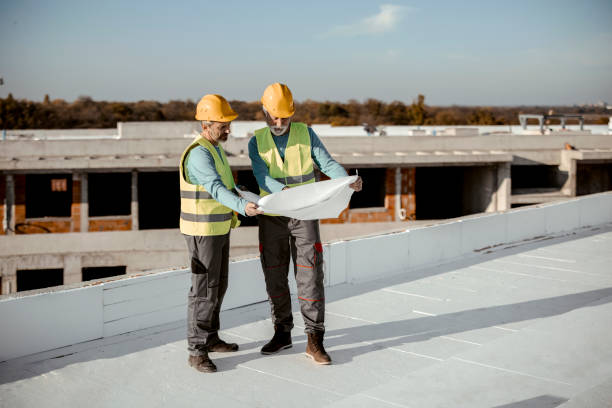 two foreman discussions on construction site under development.